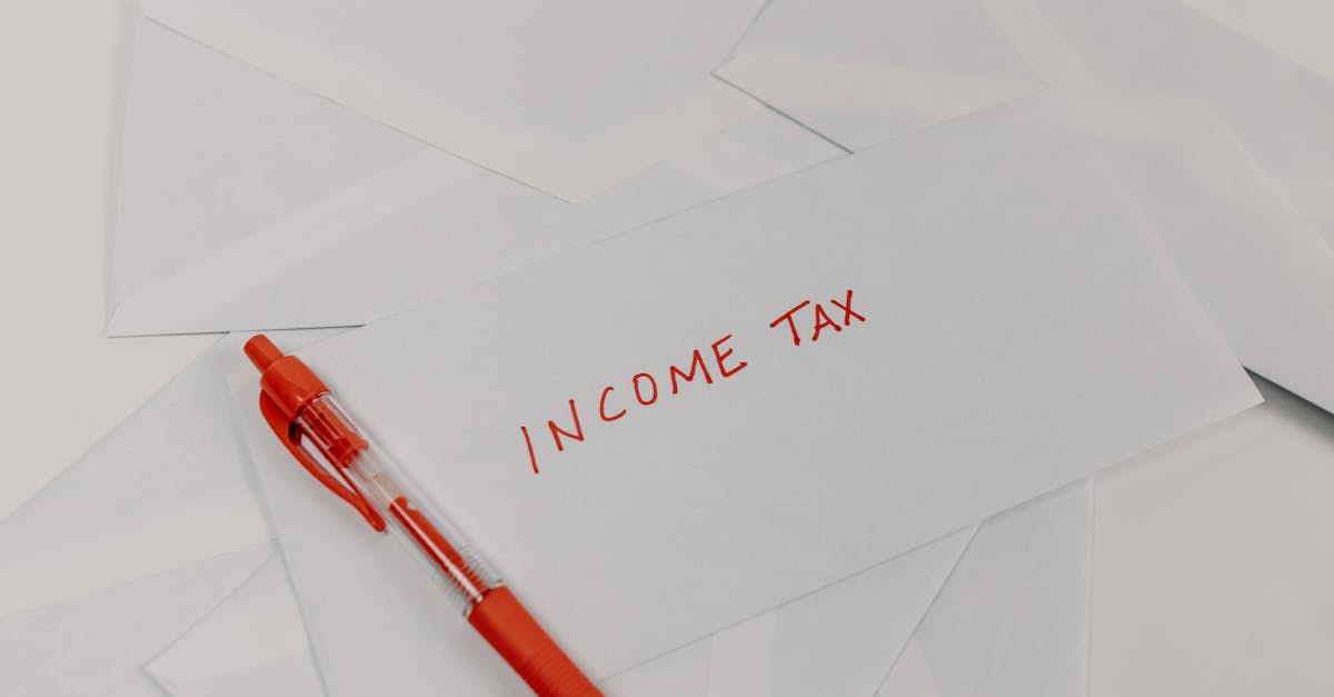 Income tax documents showing slab rate calculations for Pakistan 2025-26